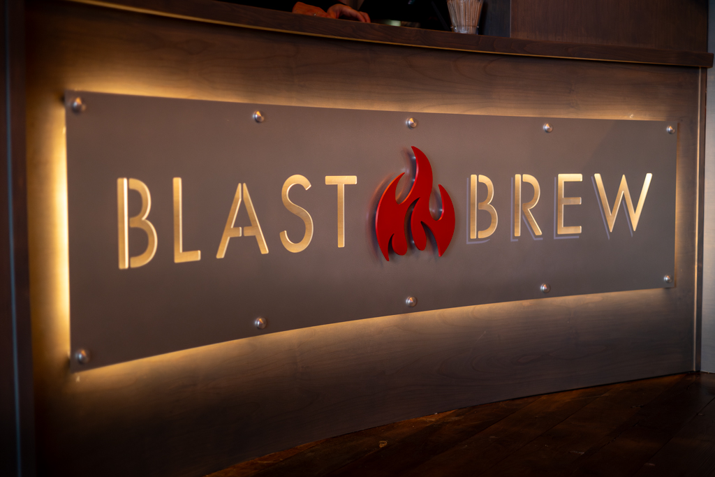 Blast and Brew metal logo.